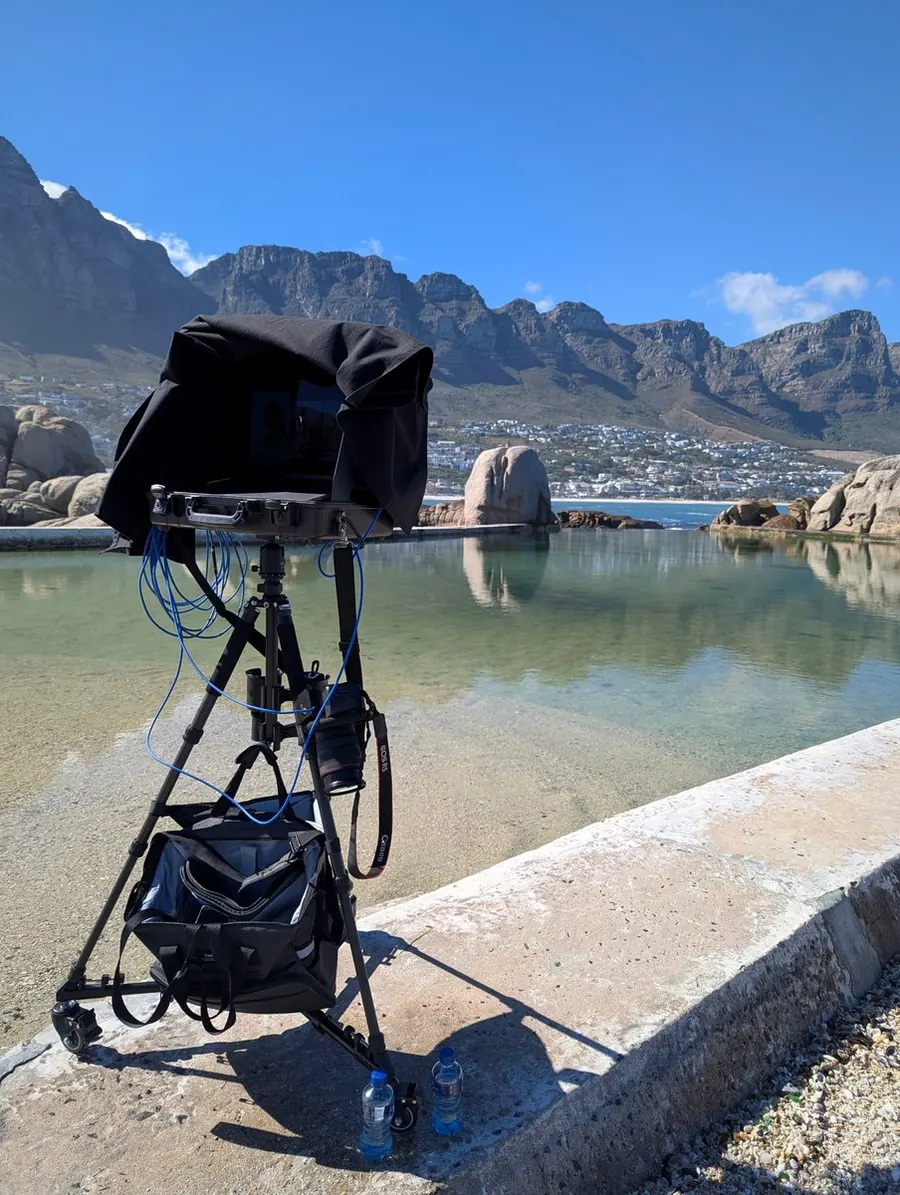 A tethered camera workstation beside a tidal pool below the Twelve Apostles